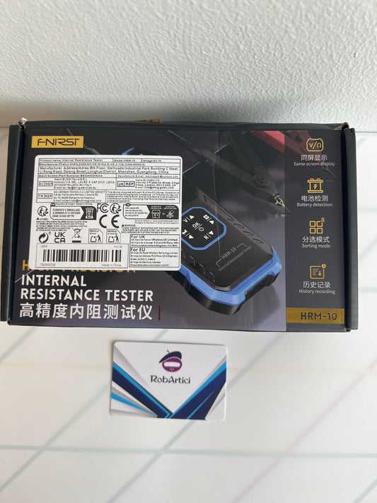 FNIRSI HRM10 internal resistance tester retail packaging.