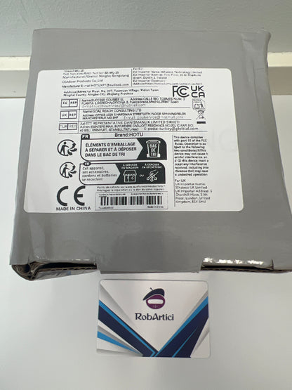 Wide application work light retail packaging showcasing product information.