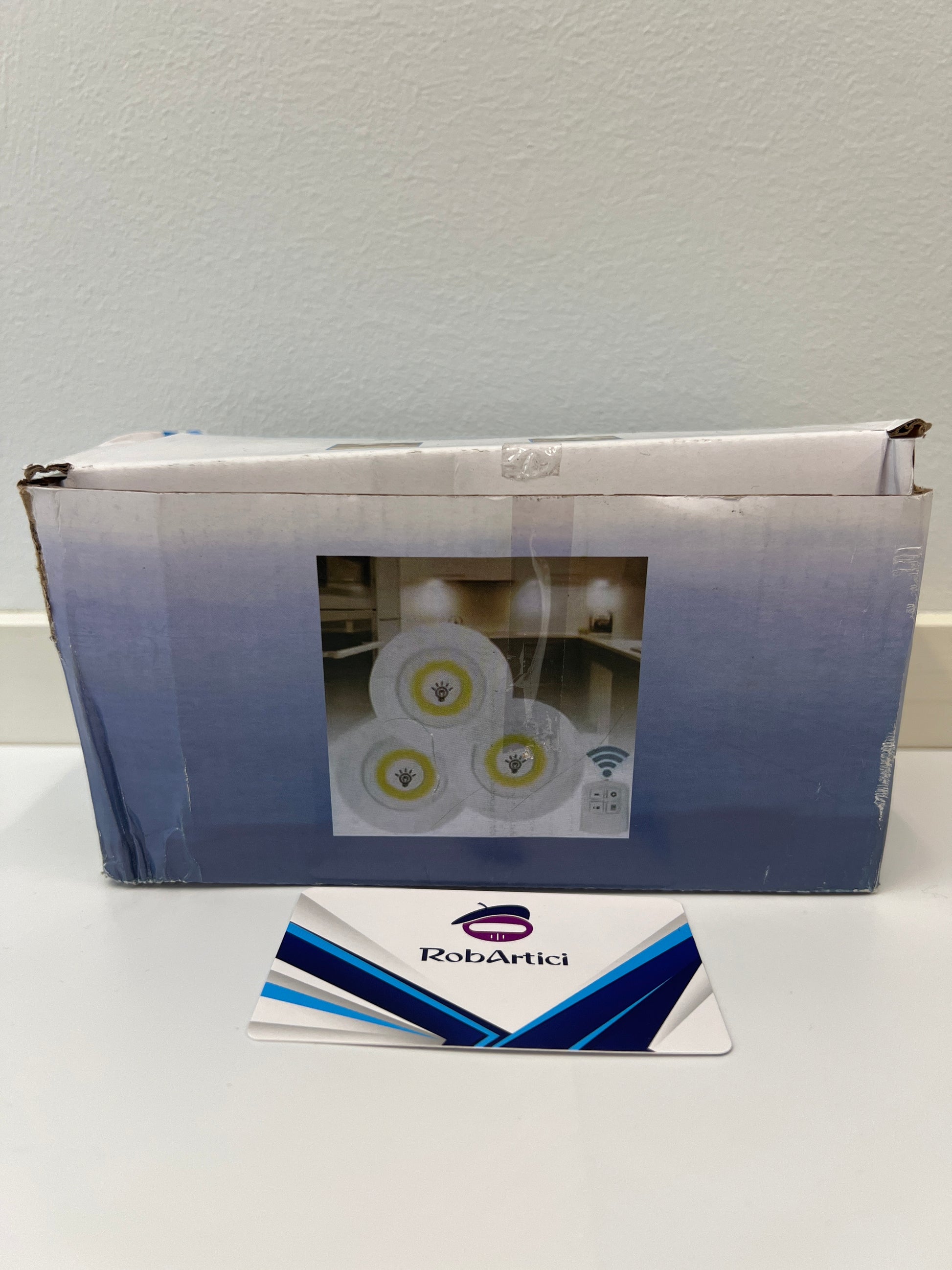 CYCG round LED light retail packaging side view, showcasing the lights installed and illuminated in a room