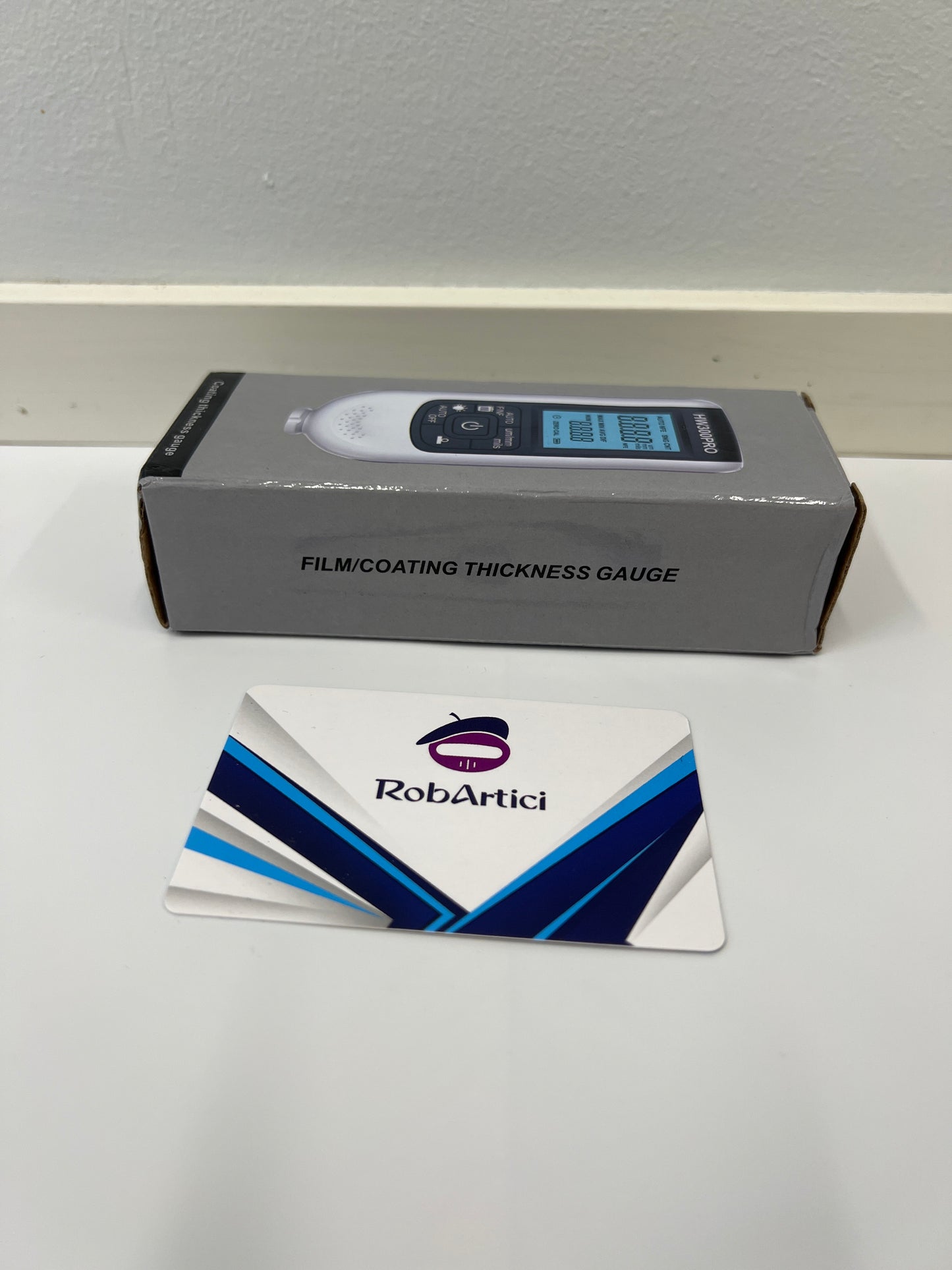 HW300PRO film thickness gauge retail packaging side view.