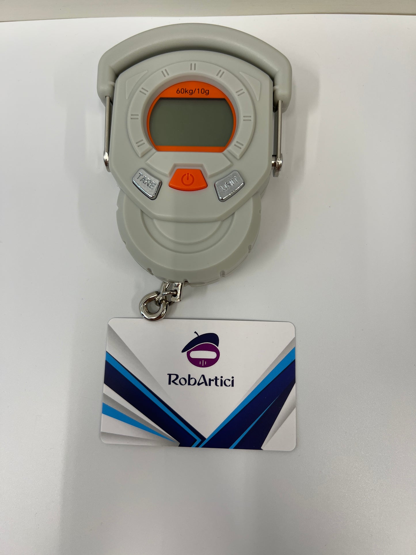 High precision handheld electronic scale showcasing digital display monitor and control buttons.