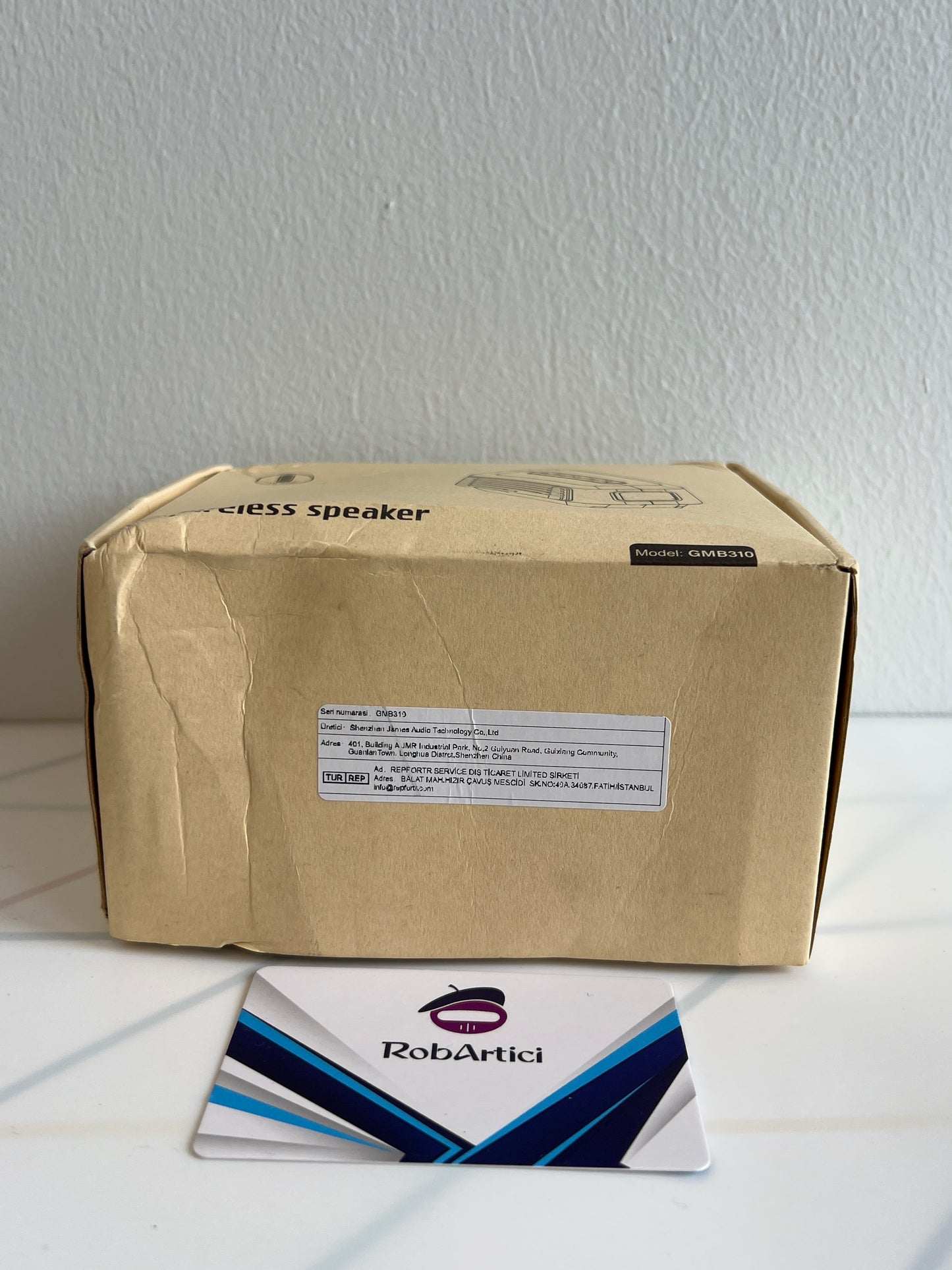 GMB310 job site wireless speaker retail packaging, showing product specifications.