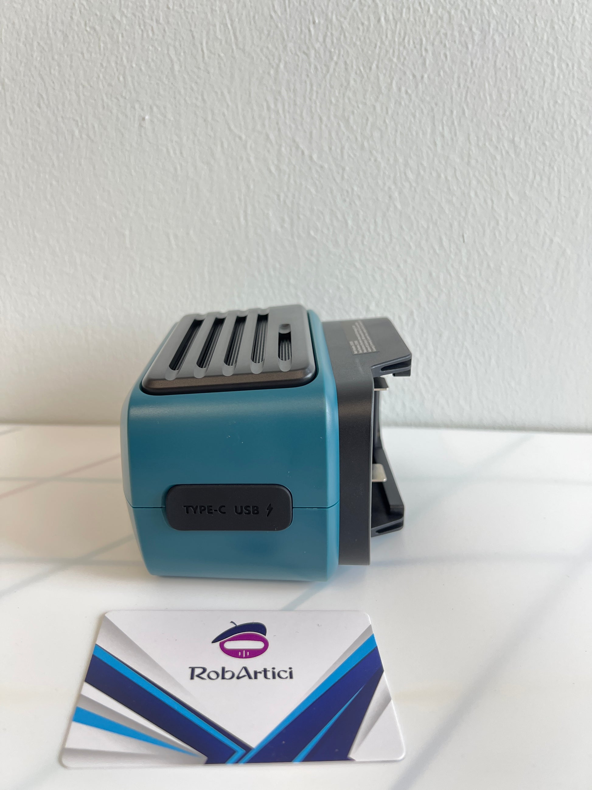 GMB310 job site wireless speaker side view showcasing the USB Type-C charging compatibility.
