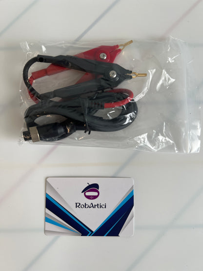 FNIRSI HRM10 internal resistance tester included accessory connection cables.