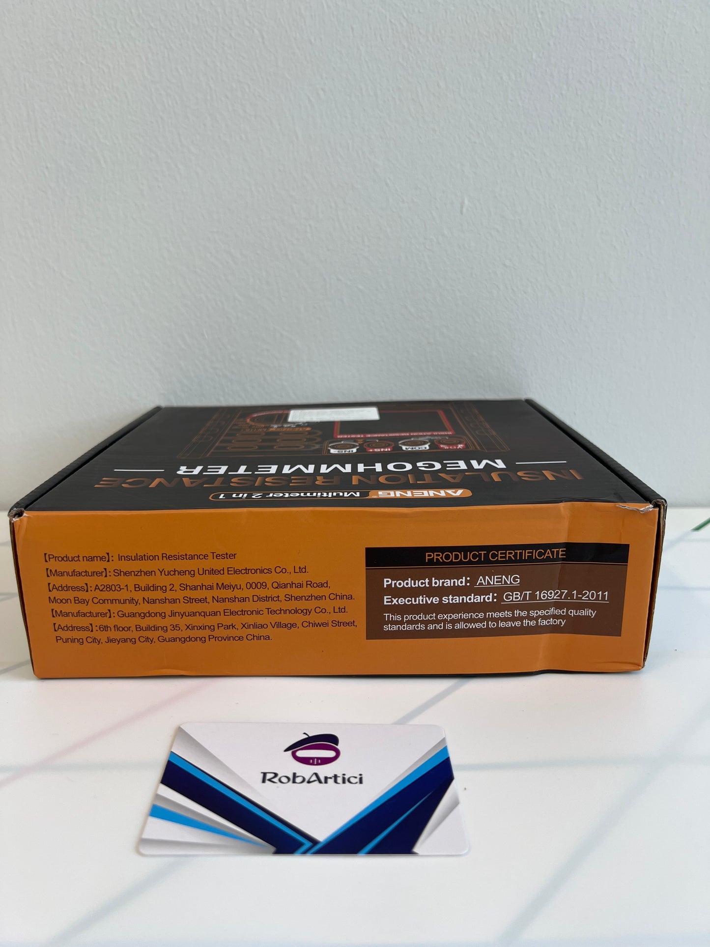 ANENG MH15 insulation resistance tester retail packaging box side view highlighting product certification.