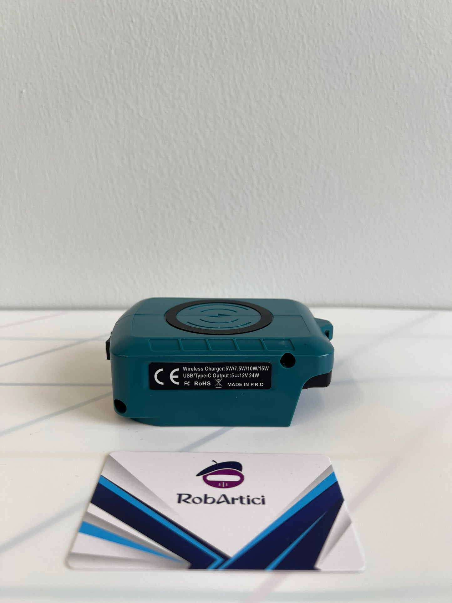 MAK12 battery adapter side view, showing product information. 
