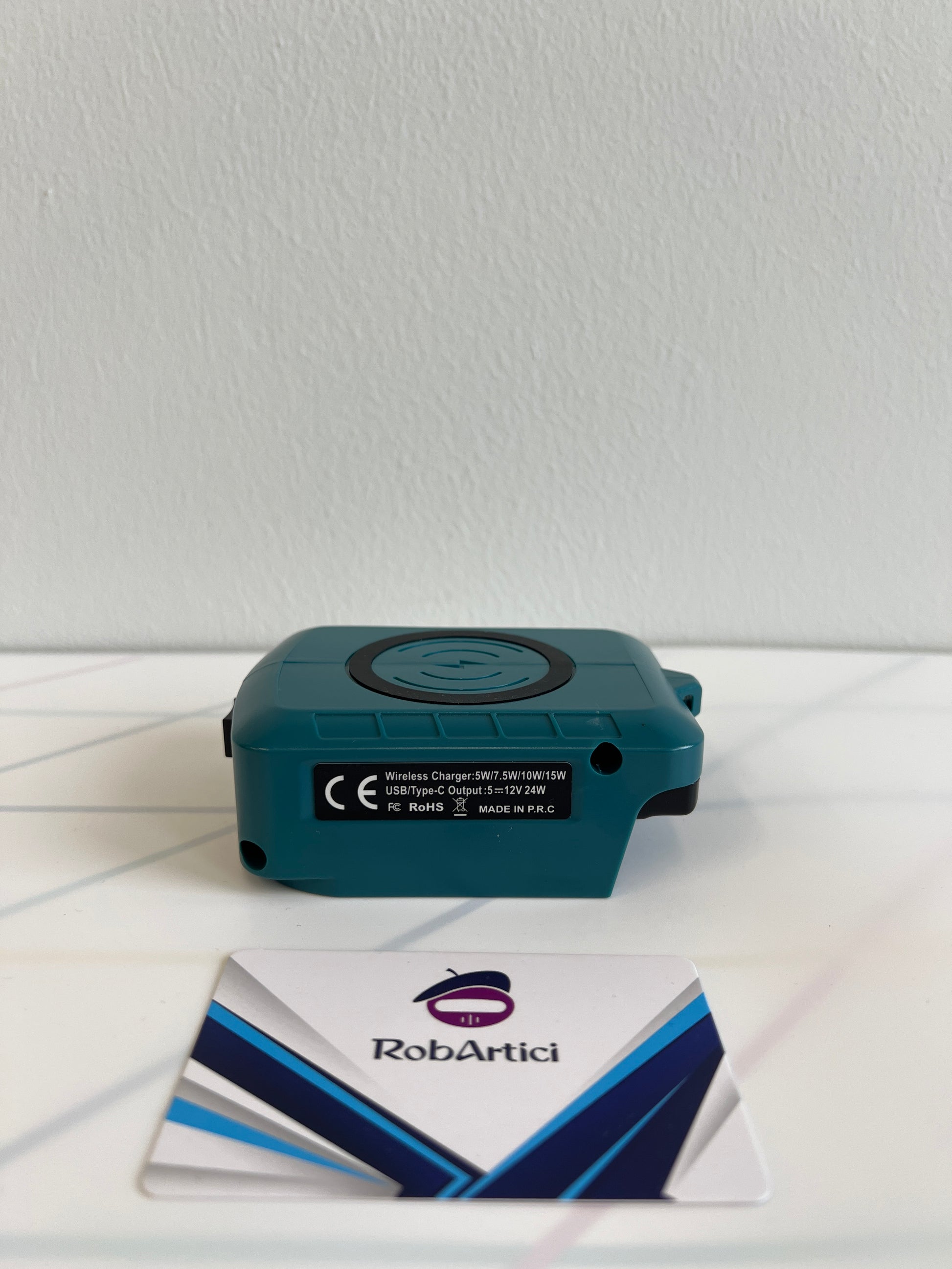 MAK12 battery adapter side view, showing product information. 