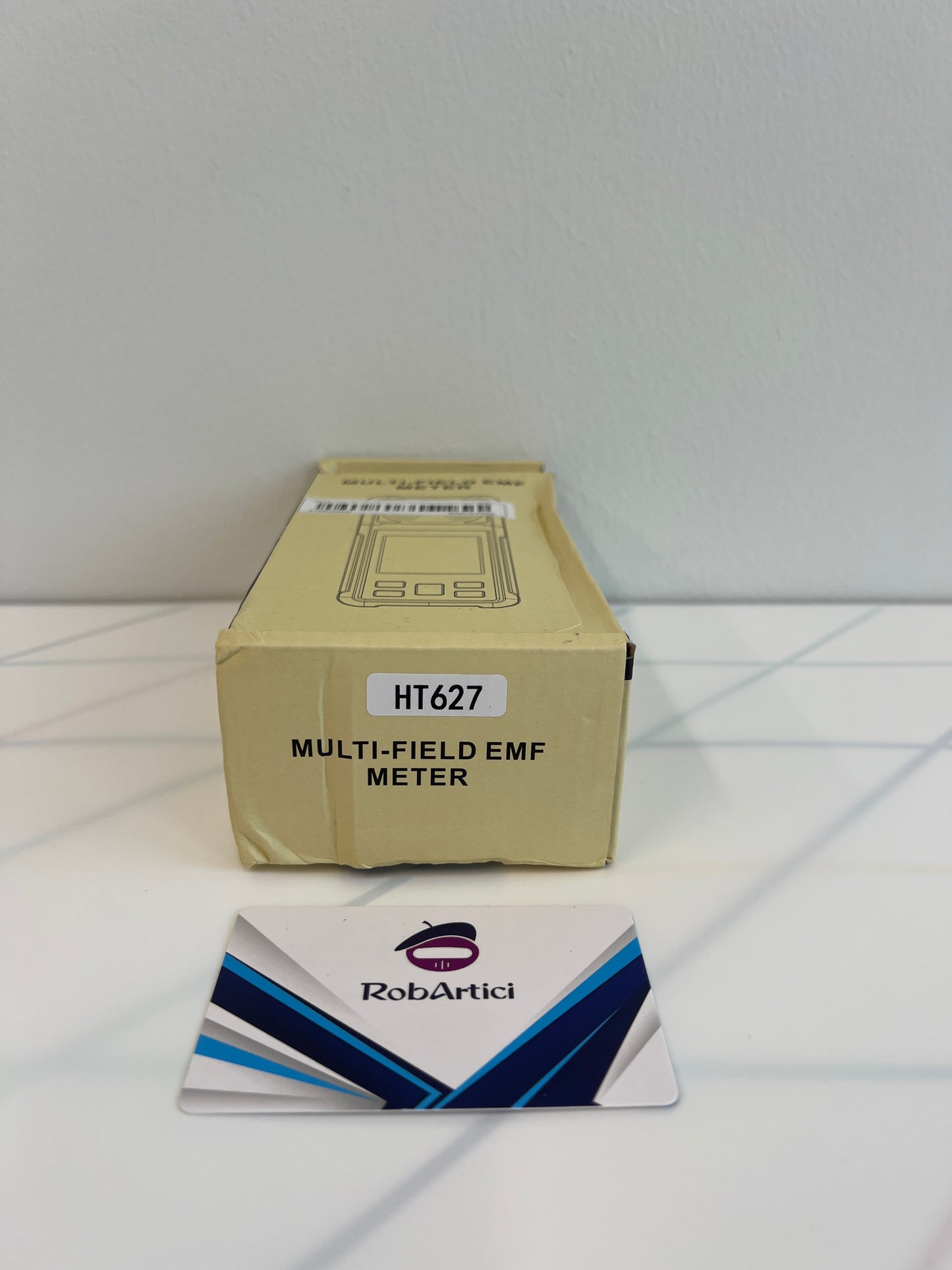 HT627 portable multi-field EMF meter retail packaging side view.