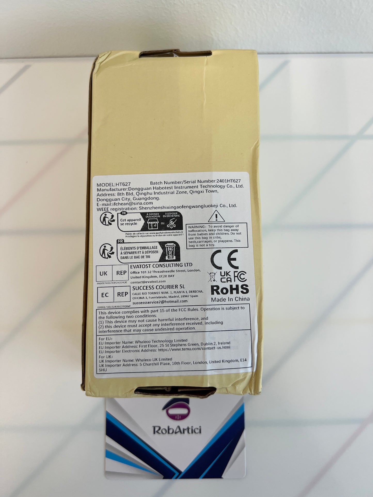 HT627 portable multi-field EMF meter retail packaging back view, showcasing product information.