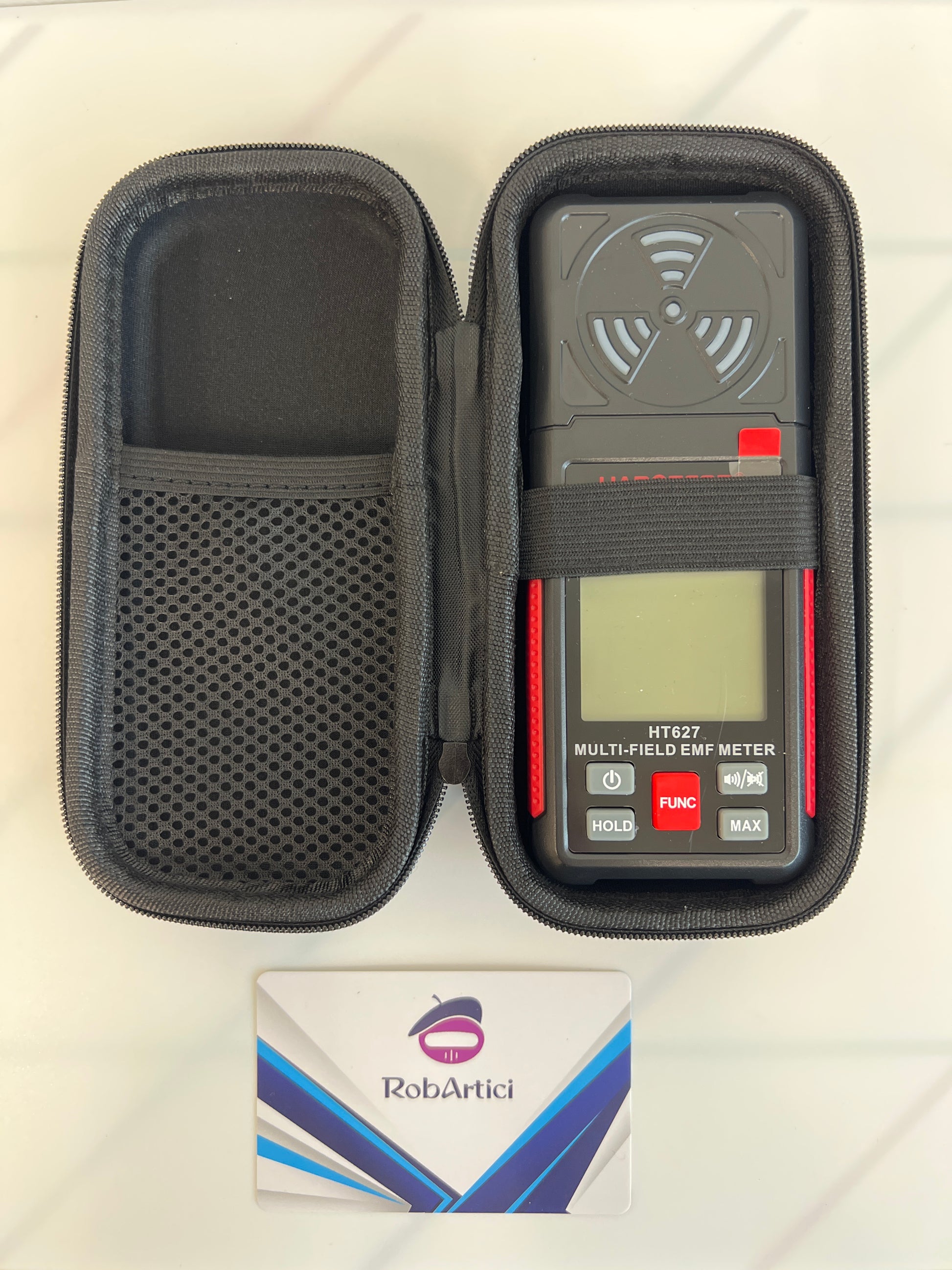 Front view of the HT627 portable EMF meter with digital screen and control buttons.