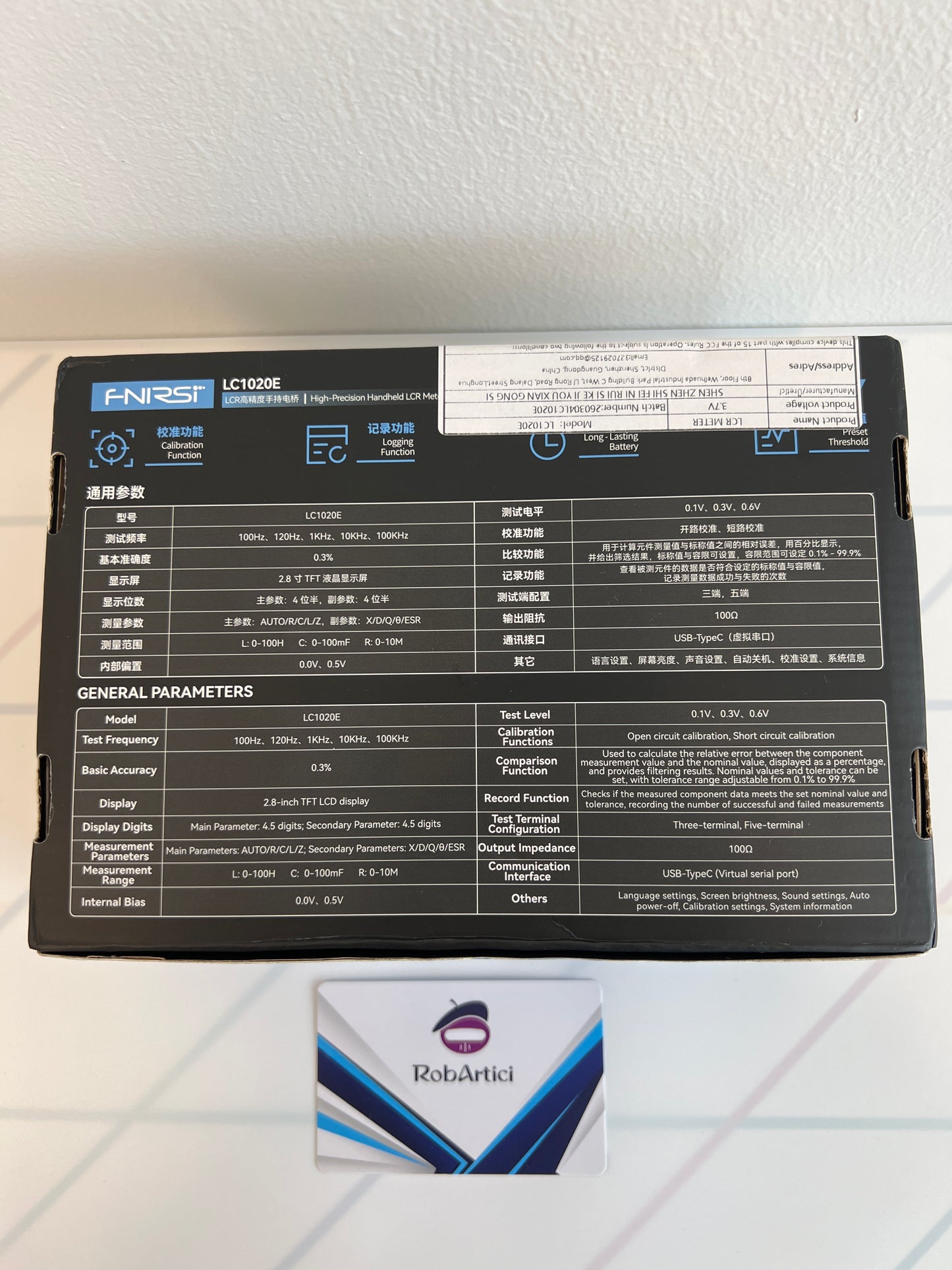 FNIRSI LC1020E handheld LCR meter retail packaging box back view with product information 