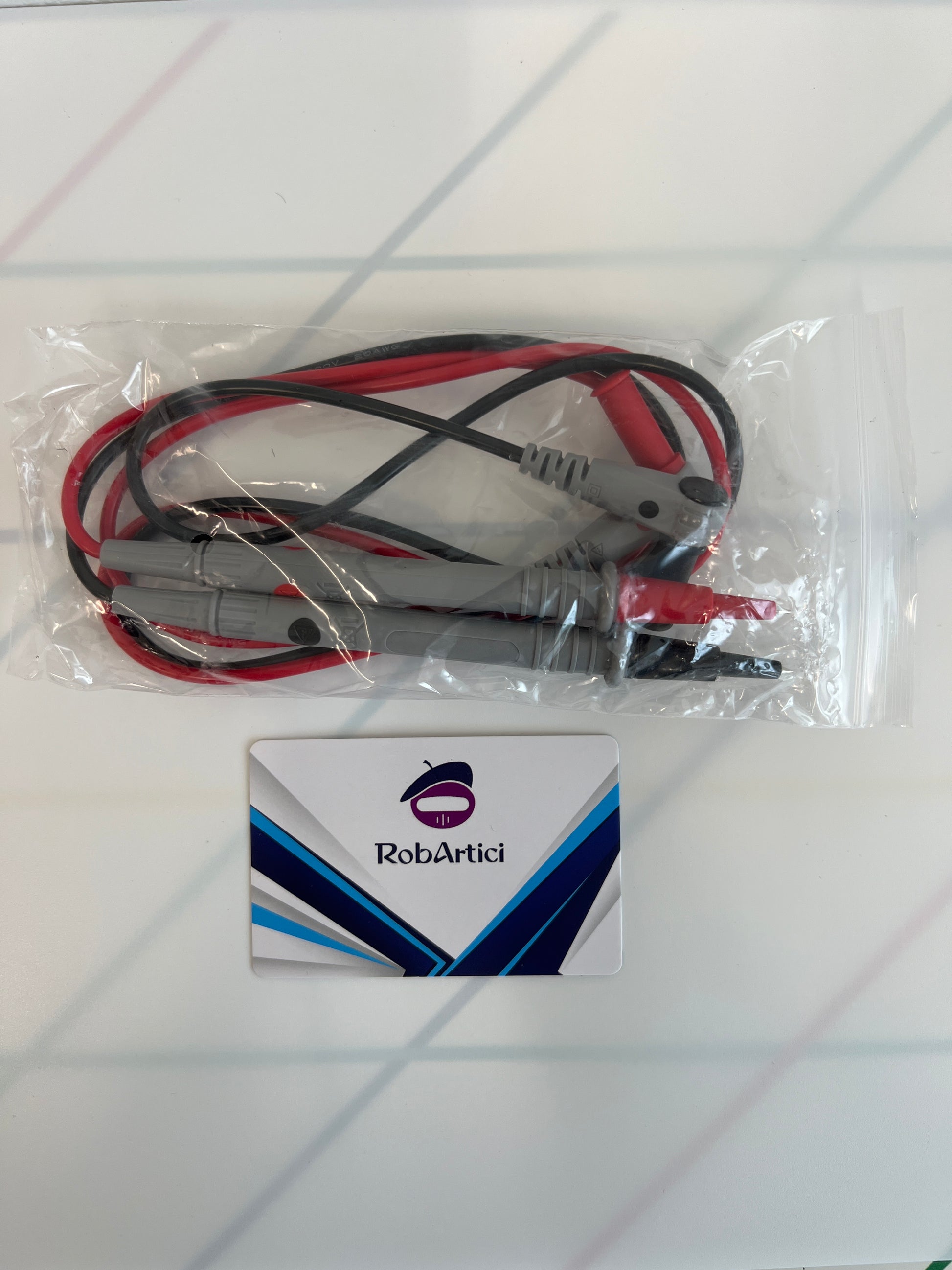 FNIRSI LC1020E handheld LCR meter accessories featuring the included measurement test cable