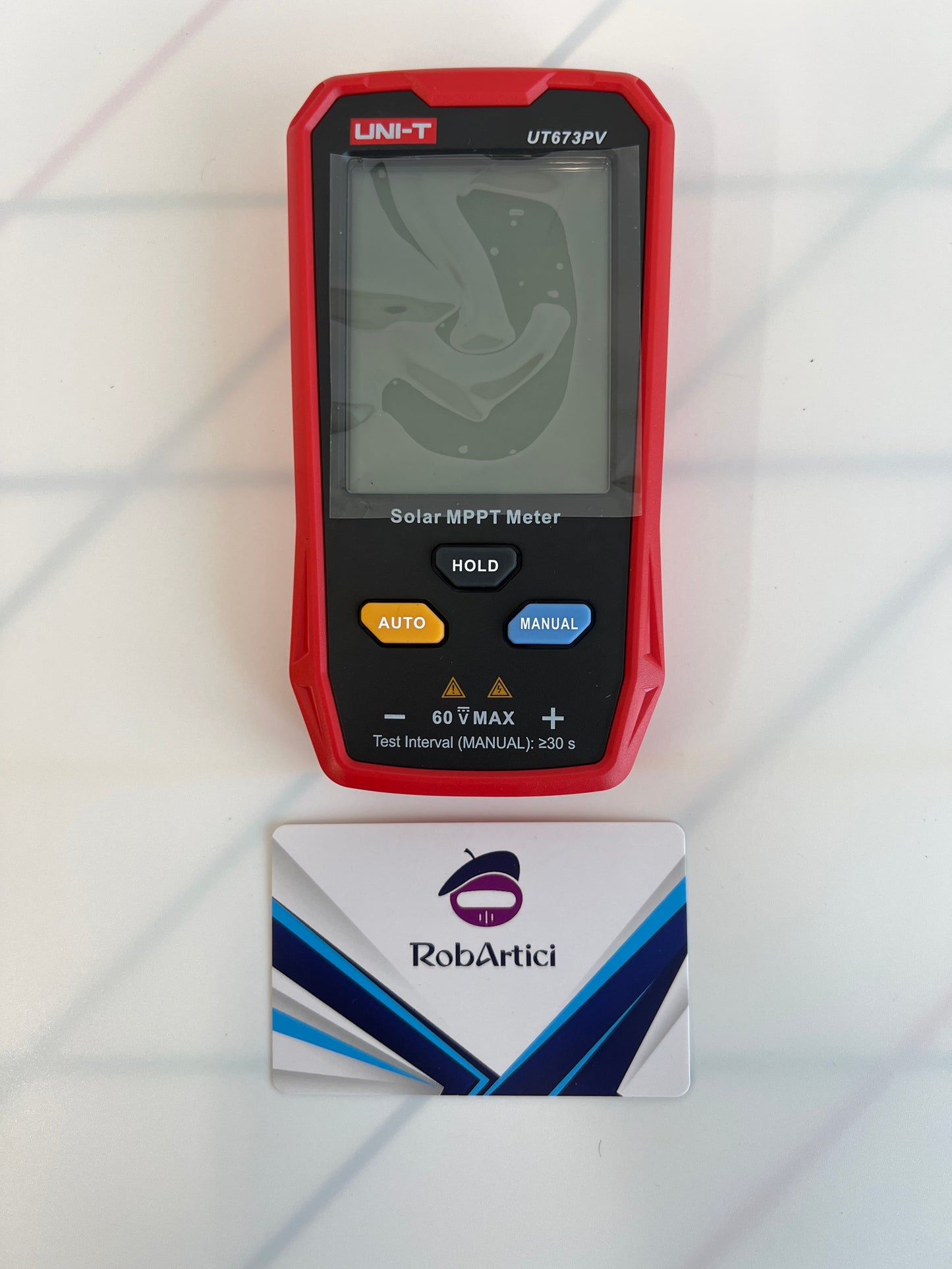 UT673PV solar MPPT meter measuring device front view, showcasing the large digital display monitor and control buttons.
