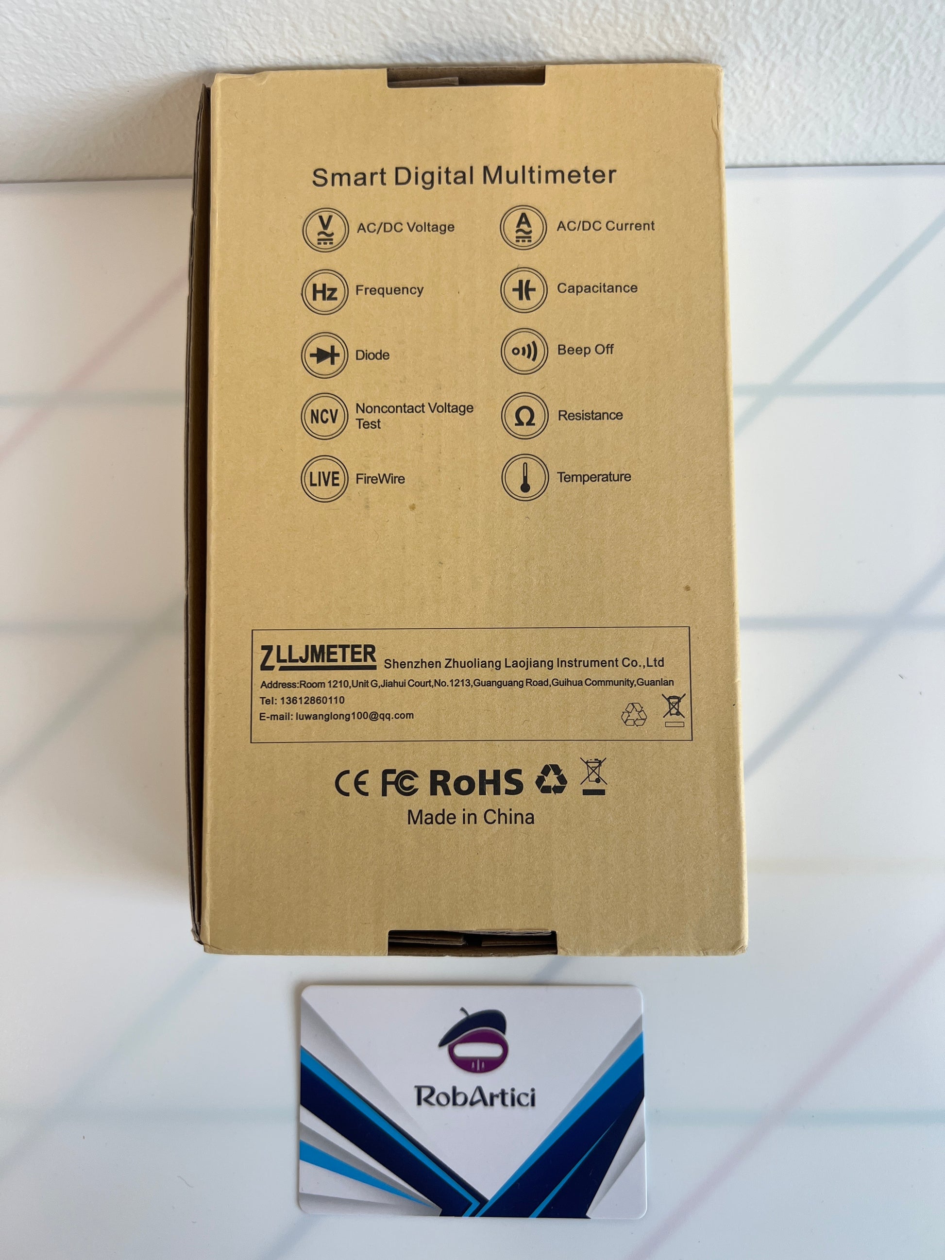 ZL116 smart digital multi meter retail packaging showcasing product features.