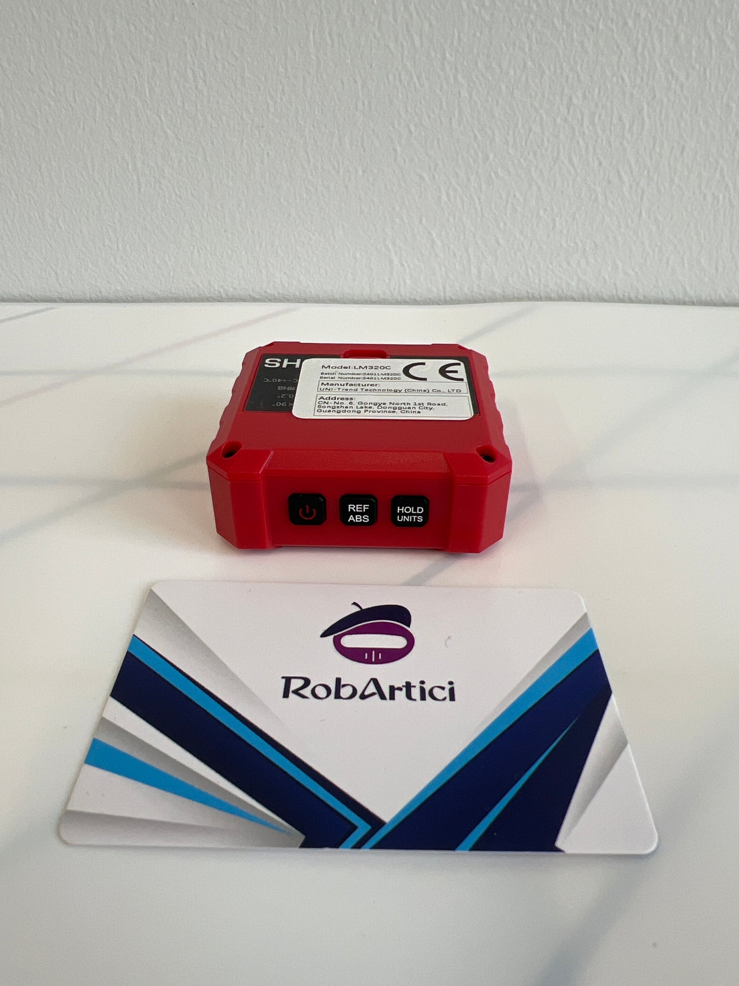 UNI-T LM320C digital angle meter view of control buttons. 