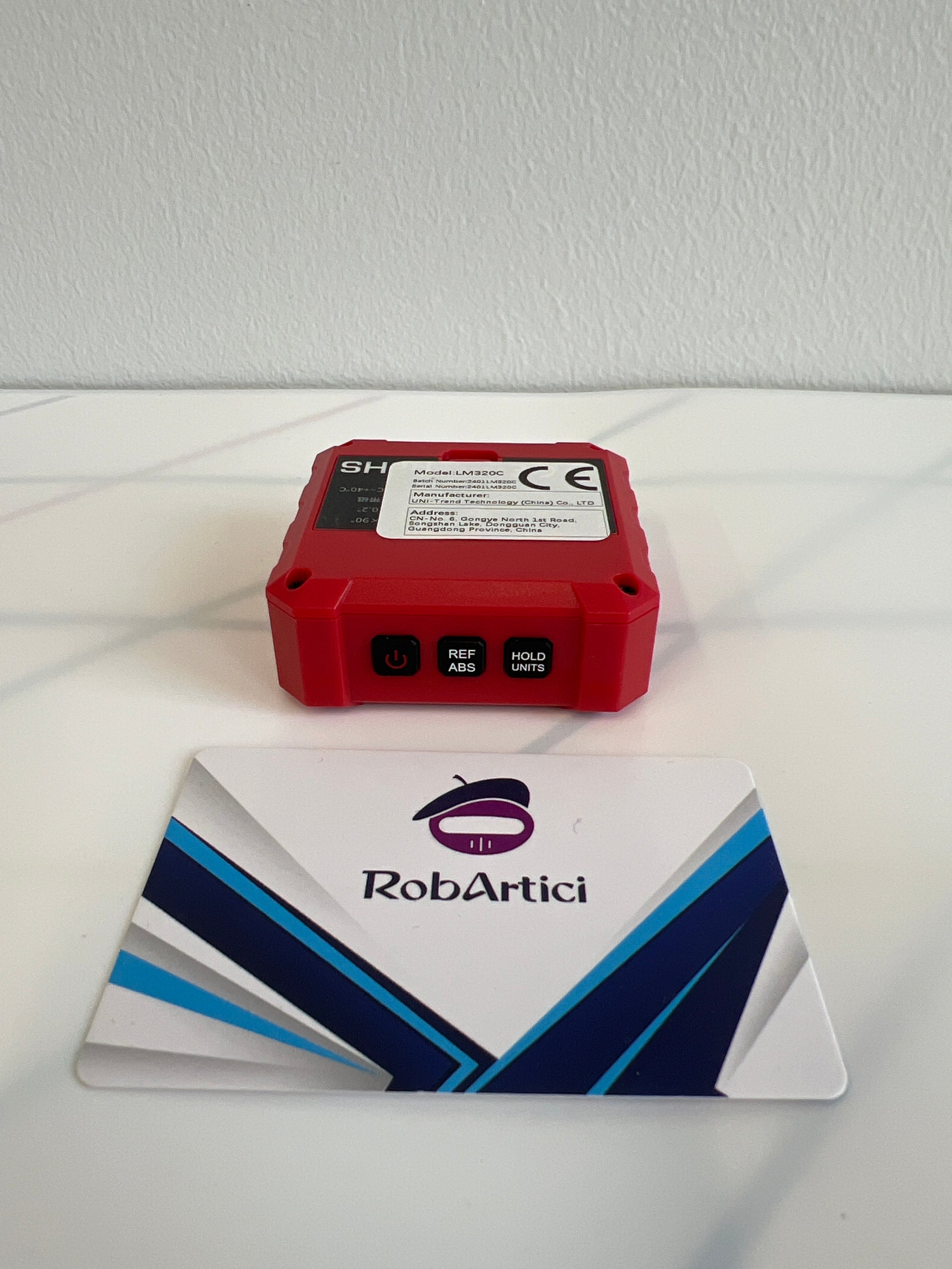 UNI-T LM320C digital angle meter view of control buttons. 