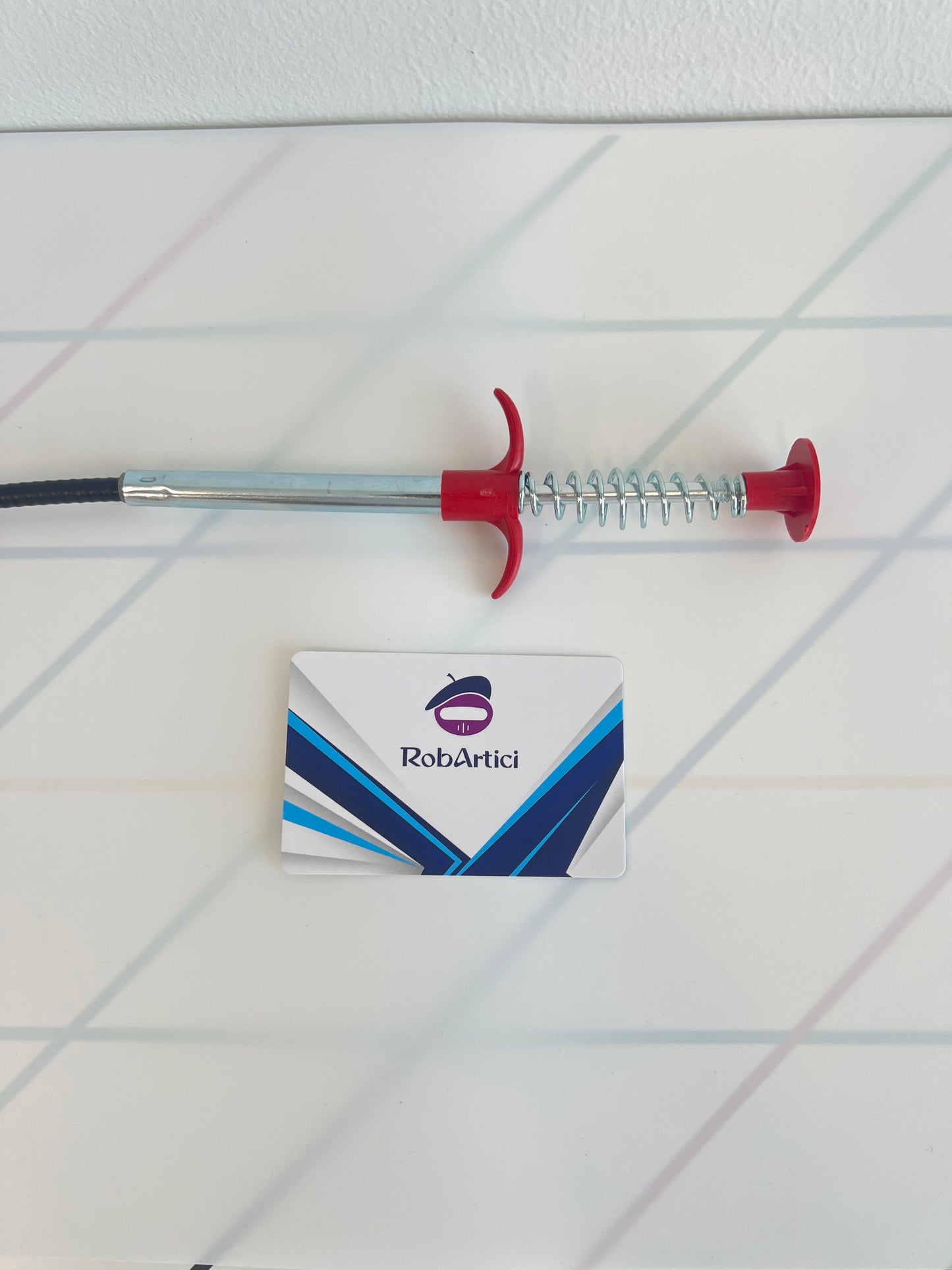 CosyCloud drain unclogger tool.